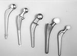 Femoral components of hip prostheses